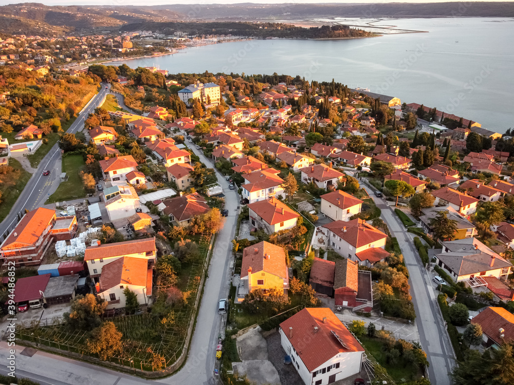 aerial drone view village at seaside with red roofs - obrazy, fototapety, plakaty 