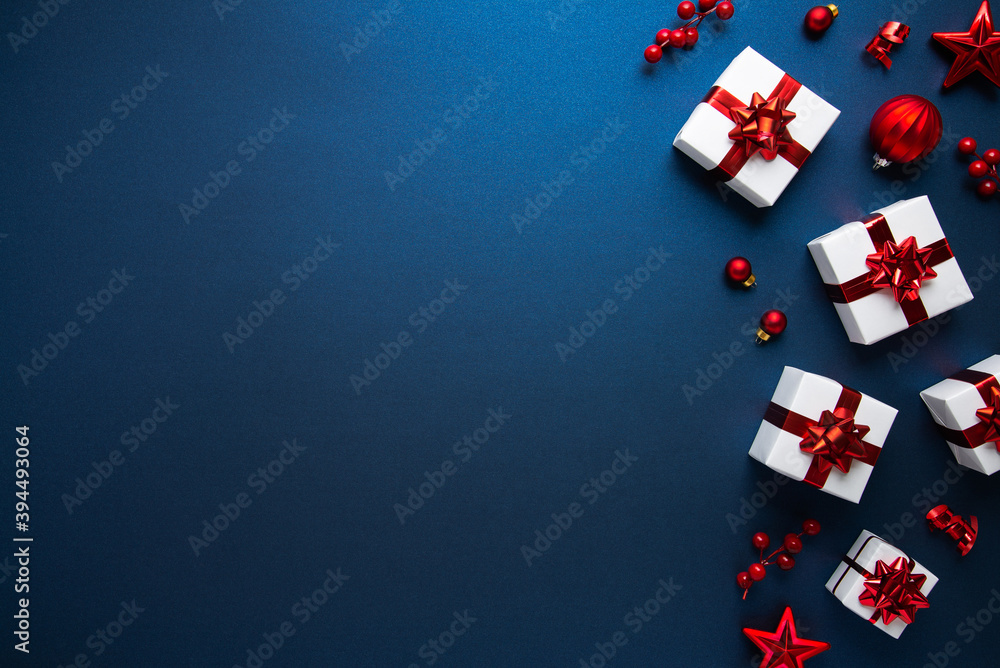 Merry Christmas and Happy Holidays greeting card, frame, banner. New Year. Noel. Christmas ornaments and gift box on blue background top view. Winter xmas holiday theme. Flat lay
Merry Christmas and Happy Holidays greeting card, frame, banner. New Year. Noel. Christmas ornaments and gift box on blue background top view. Winter xmas holiday theme. Flat lay
