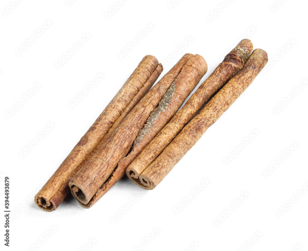 Brown cinnamon sticks isolated on white background. Aromatic food ingredients Brown cinnamon sticks isolated on white background. Aromatic food ingredients
