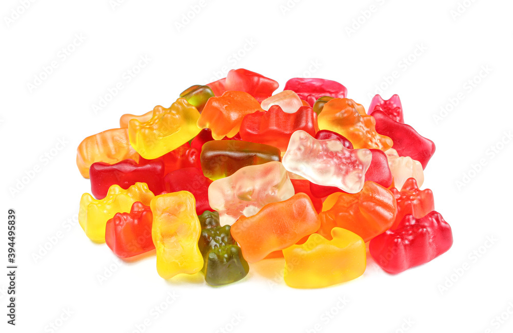 Pile of colorful gummy bears isolated on white background. Delicious jelly treats