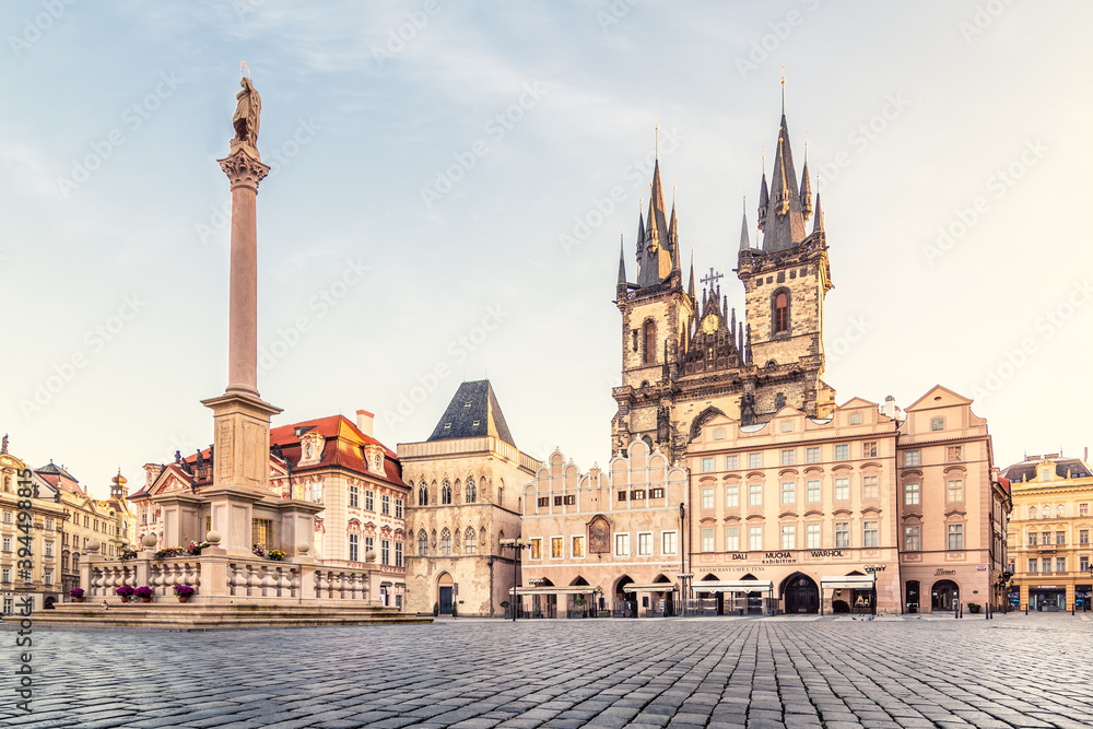 Beautiful early morning on empty Oldtown square with Church of Our Lady before Týn and Marian column, Prague, Czech Republic