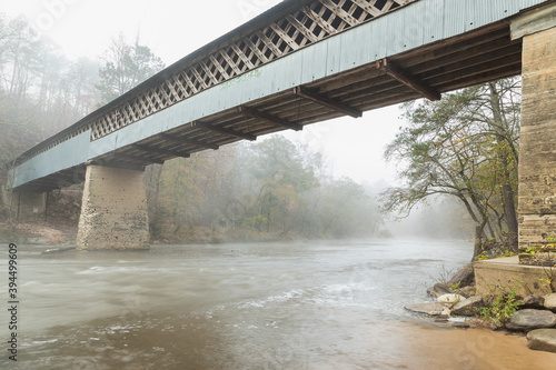 Swann Covered Bridge in Blount County Alabama in the Autumn fog