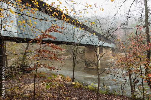 Swann Covered Bridge in Blount County Alabama in the Autumn fog