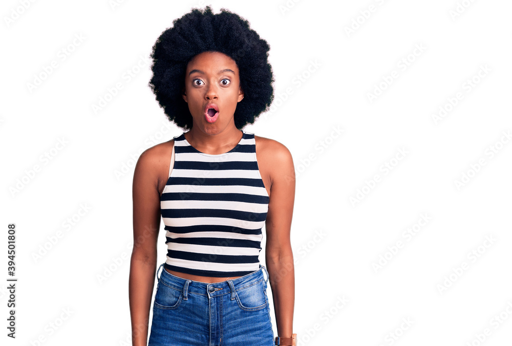 Young african american woman wearing casual clothes scared and amazed with open mouth for surprise, disbelief face Young african american woman wearing casual clothes scared and amazed with open mouth for surprise, disbelief face