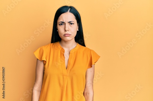 Beautiful young woman wearing casual clothes skeptic and nervous, frowning upset because of problem. negative person. © Krakenimages.com