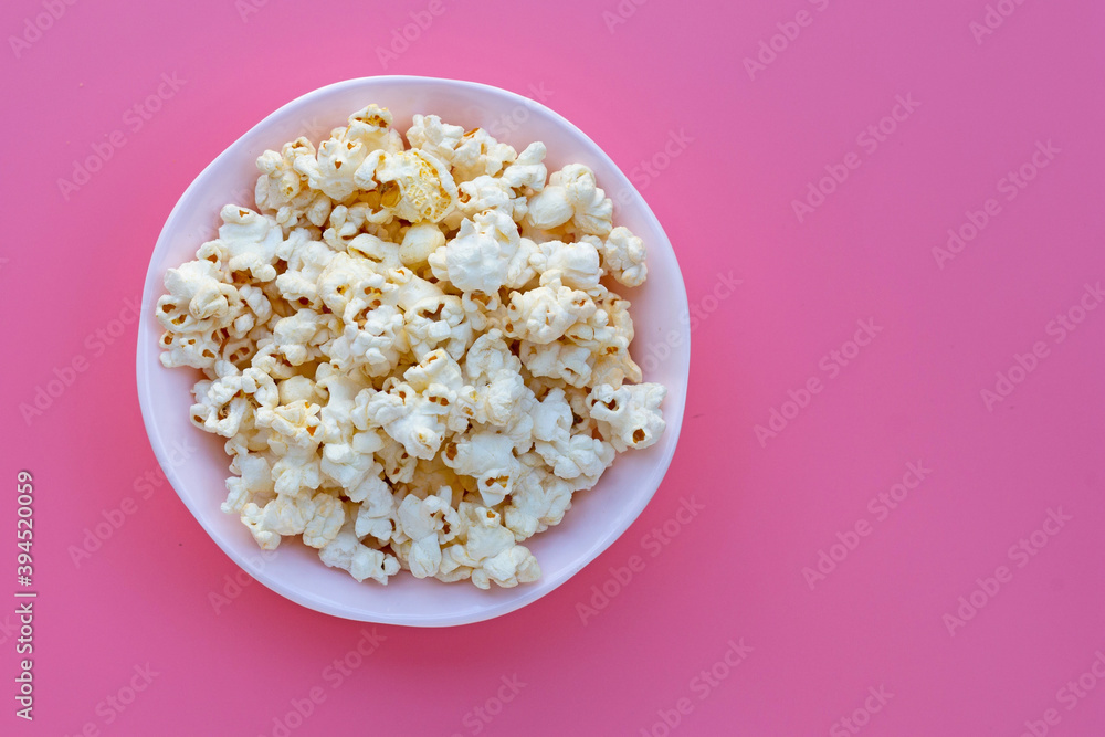 Popcorn on pink background. Copy space Popcorn on pink background. Copy space