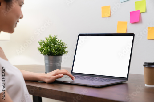 Wallpaper Mural Business women hand using laptop and type on the keyboard. Mockup screen of advertisement. Torontodigital.ca