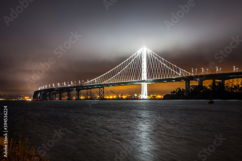 Bay Bridge at foggy night. San Francisco  California