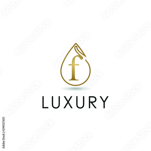 Elegant luxury initial f letter for cosmetic, make up, hotel, boutique business logo concept with golden line art liquid or water drop icon