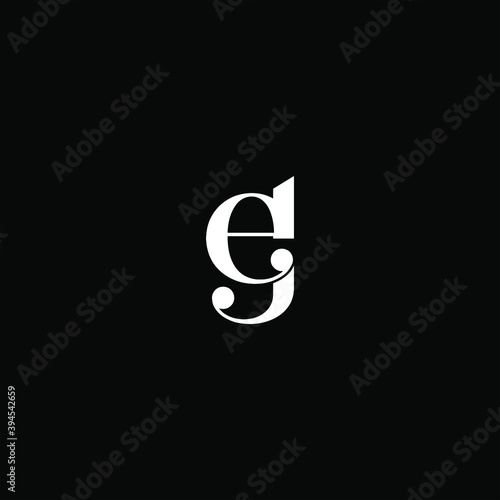 E G letter logo abstract design on black color background, eg monogram