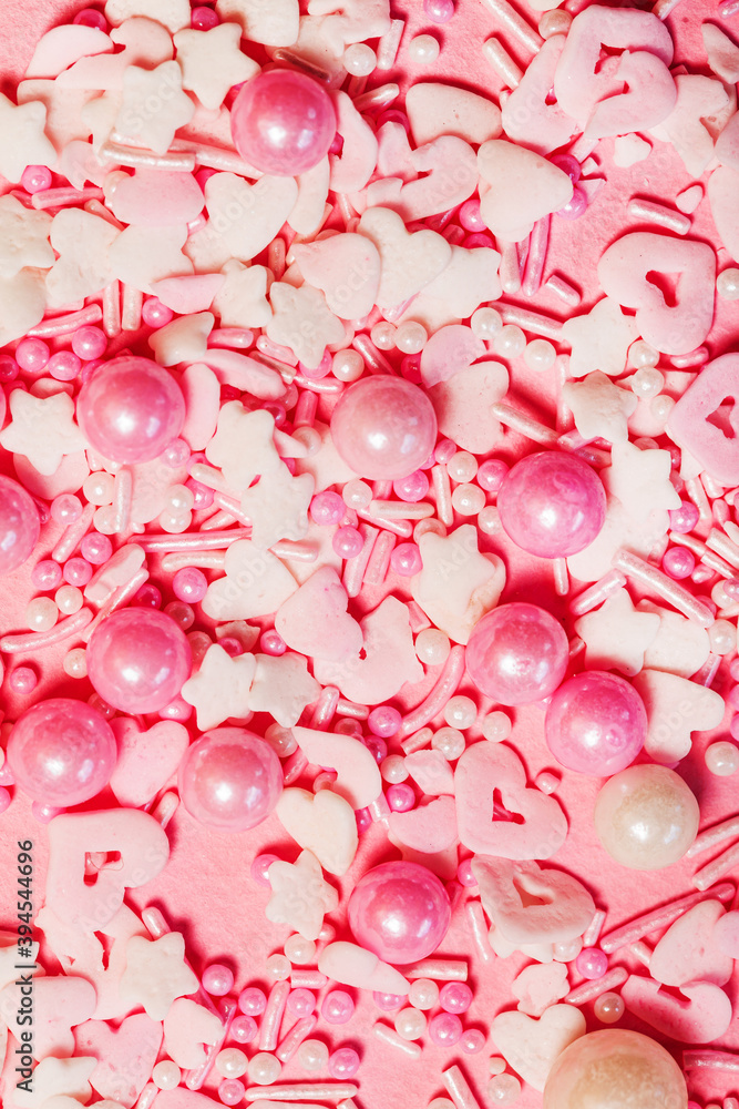 pink sugar sprinkles or confetti closeup pink sugar sprinkles or confetti closeup