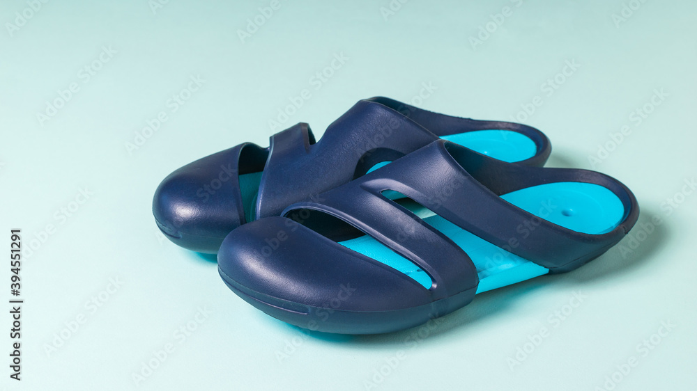 Large blue men's flip-flops for the swimming pool. Large blue men's flip-flops for the swimming pool.