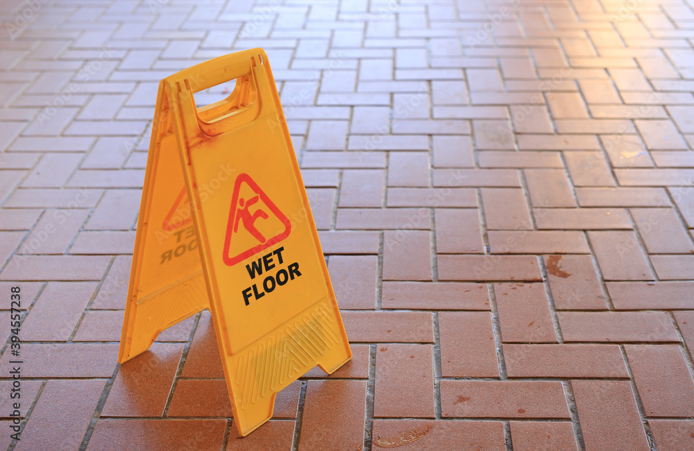 Beware of slippery floors. Caution wet floor warning Stock Photo