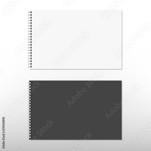 Realistic white and black spiral notepad notebook isolated on white. Vector