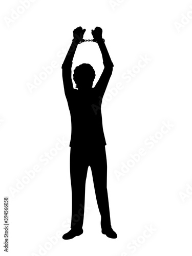 Silhouette man with your hands up in handcuffs