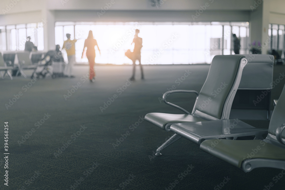 Fototapeta premium Empty airport terminal waiting area with chairs