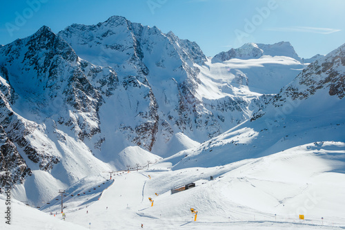 Mountains covered with snow in Solden ski area on beautiful sunny winter day, Tirol, Austria photo
