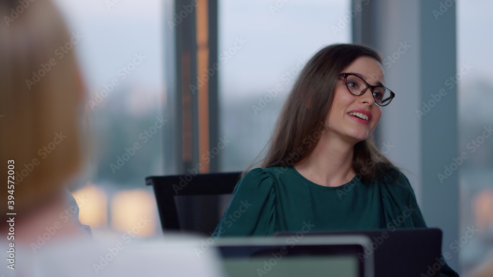 Businesswoman shaking hands with client. Entrepreneur talking with investors Businesswoman shaking hands with client. Entrepreneur talking with investors