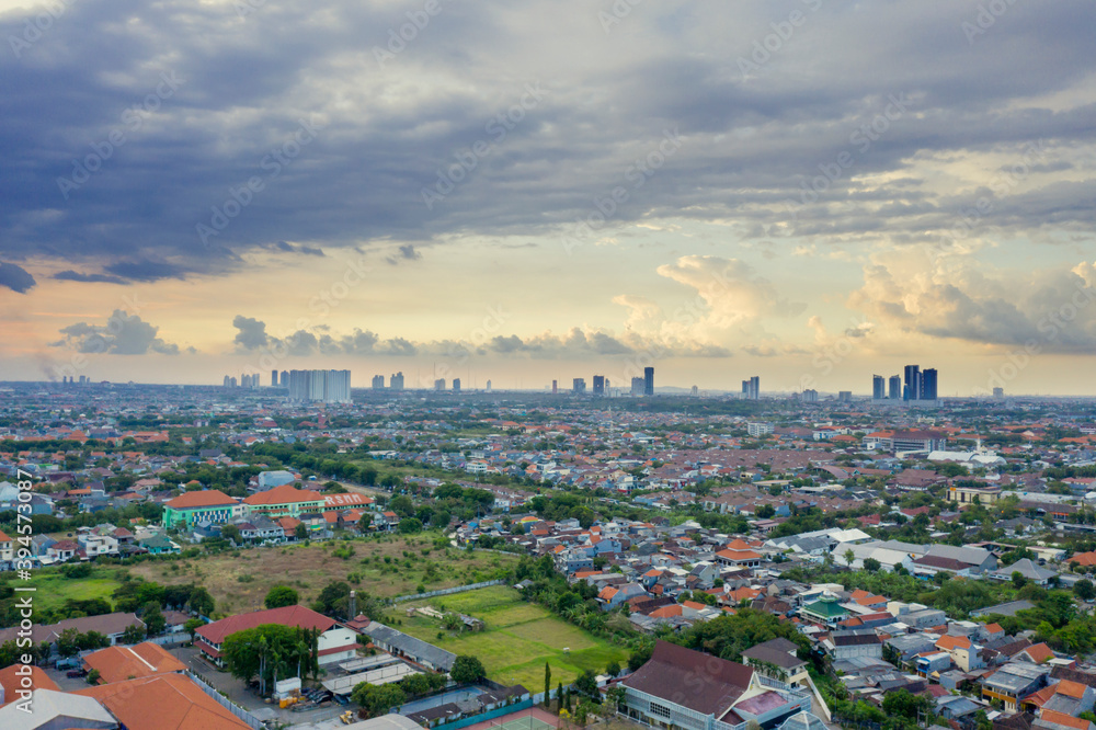 Fototapeta premium Dense residential houses with cloudy sky