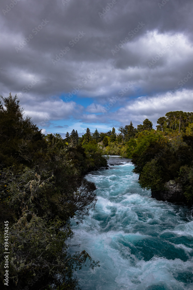 New Zealand's Huka Falls on a cloudy day