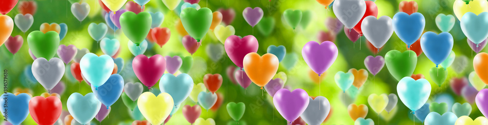 Happy Valentine's Day with colorful balloons depicting stylized hearts.