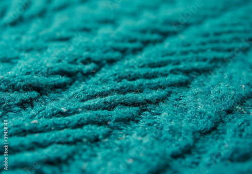 Knitted background. Knitted texture. A sample of knitting from wool. Knitting Pattern. © Mikhail