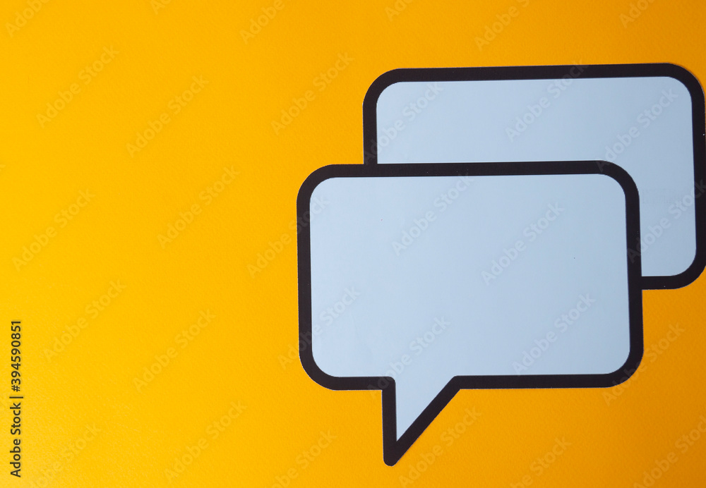 paper speech bubble on yellow background