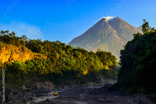 Mountain Merapi view from kali adem, most active volcano in Indonesia. photo