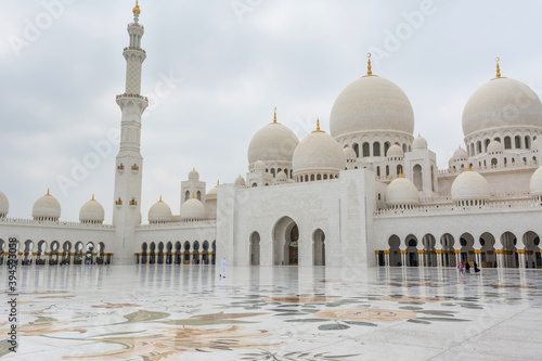 Domes of White Grand Mosque built with white marble stone, also called Sheikh Zayed Grand Mosque, inspired by Persian, Mughal and Moorish mosque architecture