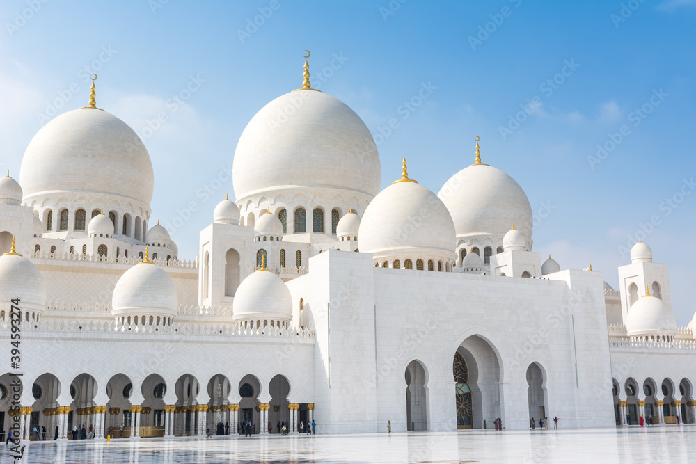 Domes of White Grand Mosque built with white marble stone, also called Sheikh Zayed Grand Mosque, inspired by Persian, Mughal and Moorish mosque architecture Domes of White Grand Mosque built with white marble stone, also called Sheikh Zayed Grand Mosque, inspired by Persian, Mughal and Moorish mosque architecture