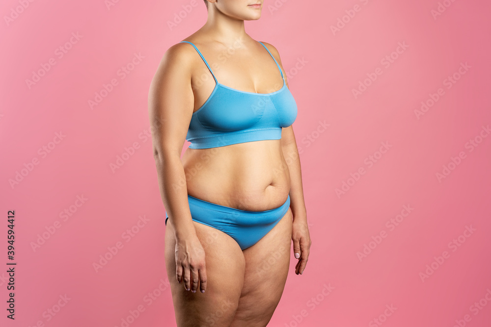 Fat woman in blue underwear on pink background, overweight female body  Stock Photo | Adobe Stock