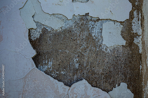 The texture of a stone wall, flooring, concrete destruction, metal corrosion and rusty antiquity, the basis of construction reinforcement and ceilings, paint chips photo