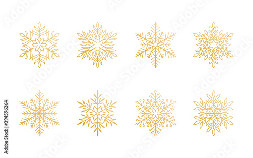Christmas snowflakes collection isolated on white background. Cute gold gradient snow icons with intricate silhouette. Nice line doodle decorative element for New year banner, cards or ornament