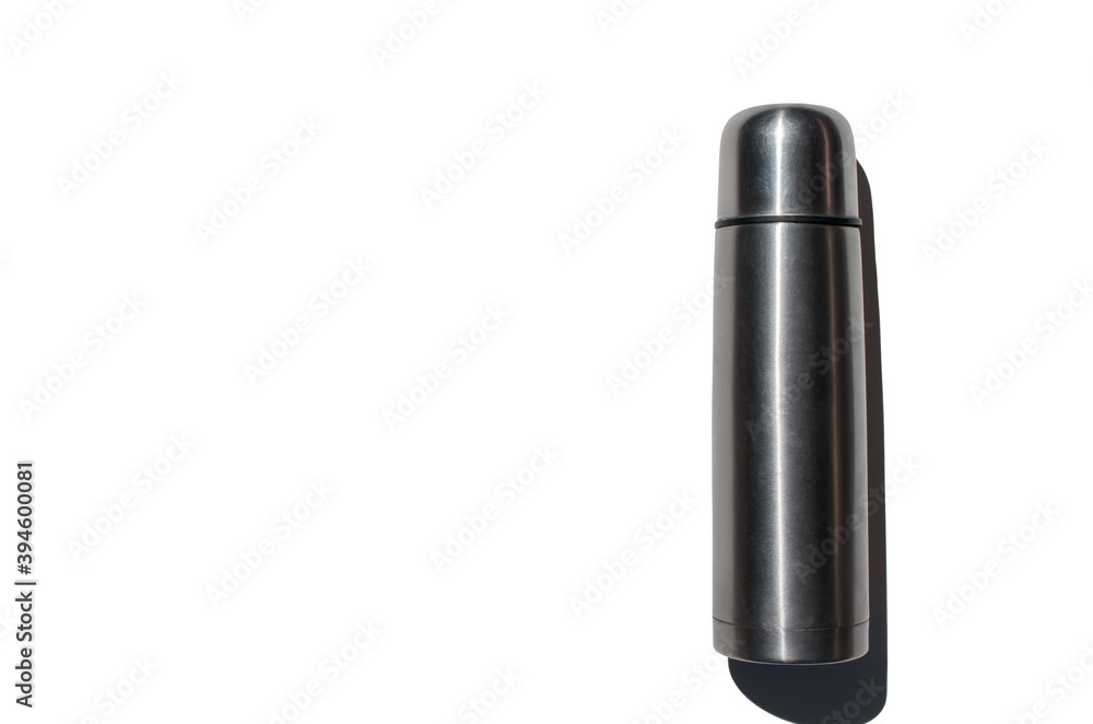Fototapeta premium Vacuum aluminum thermos isolated on a white background. Top view, copy space