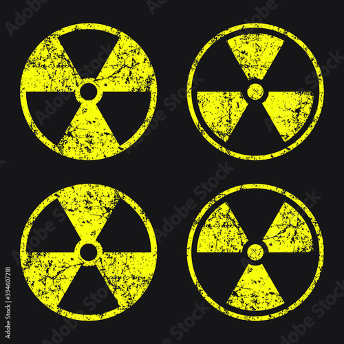 Radioactive symbol icon with grunge texture. Nuclear radiation warning sign. Atomic energy logo label. Vector illustration image.