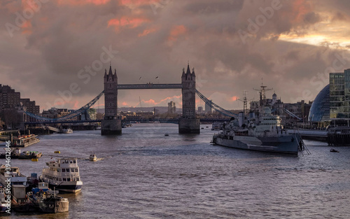 London England, the tower bridge over Thames river under dramatic sky