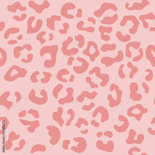 Leopard seamless pattern. Vector animal print. Pink spots on a light pink background. Jaguar, leopard, cheetah, panther fur. Leopard skin imitation can be painted on clothes, paper or fabric.