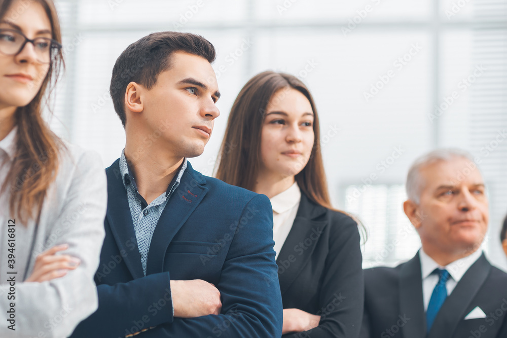 close up. diverse young professionals standing together close up. diverse young professionals standing together
