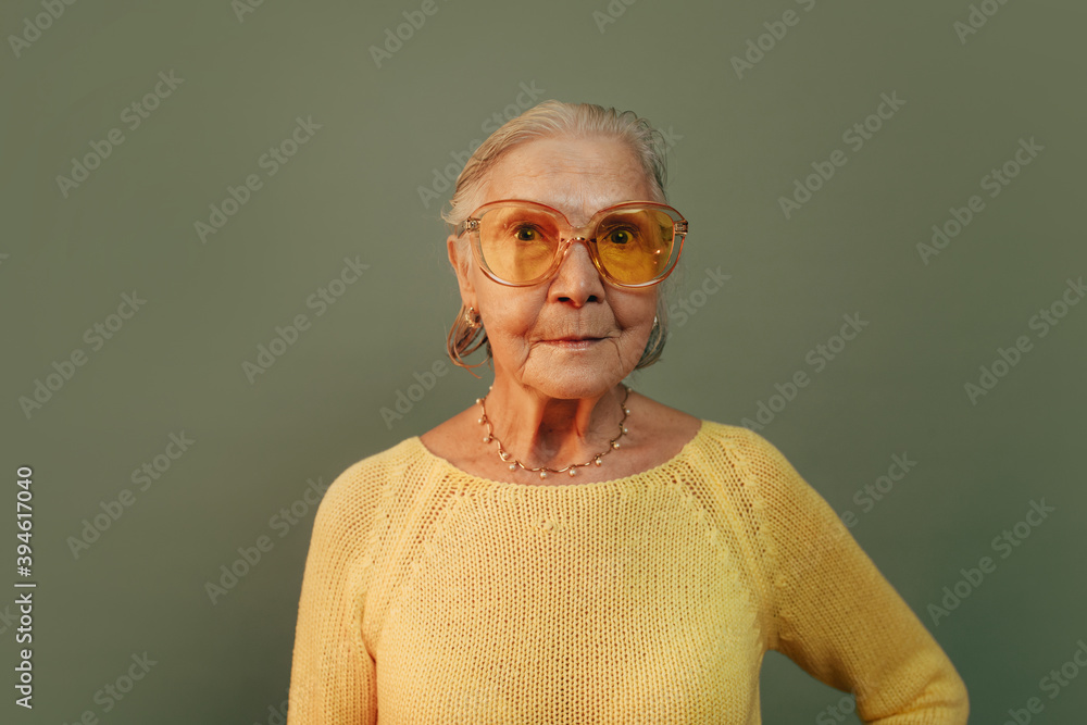 Old woman big glasses shop
