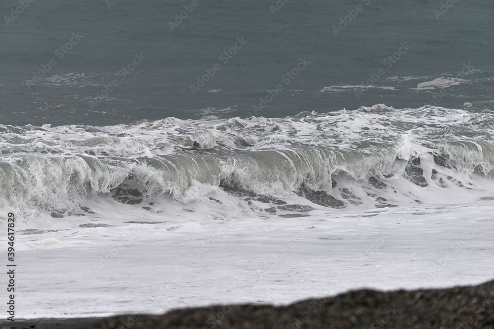 detail of a wave in a day of rough sea with strong rain and wind detail of a wave in a day of rough sea with strong rain and wind