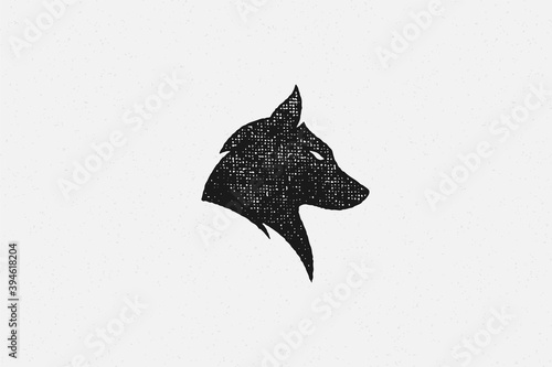 Silhouette of head wild wolf as symbol wildlife hand drawn stamp effect vector illustration.