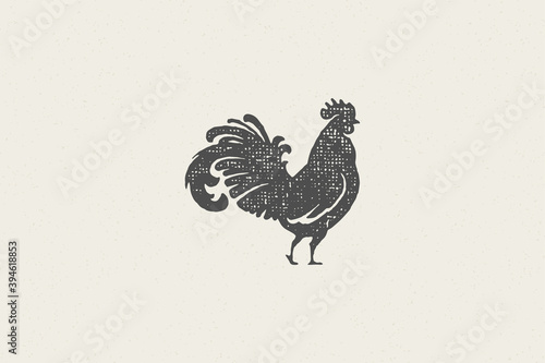 Rooster silhouette for poultry farm industry hand drawn stamp effect vector illustration. photo