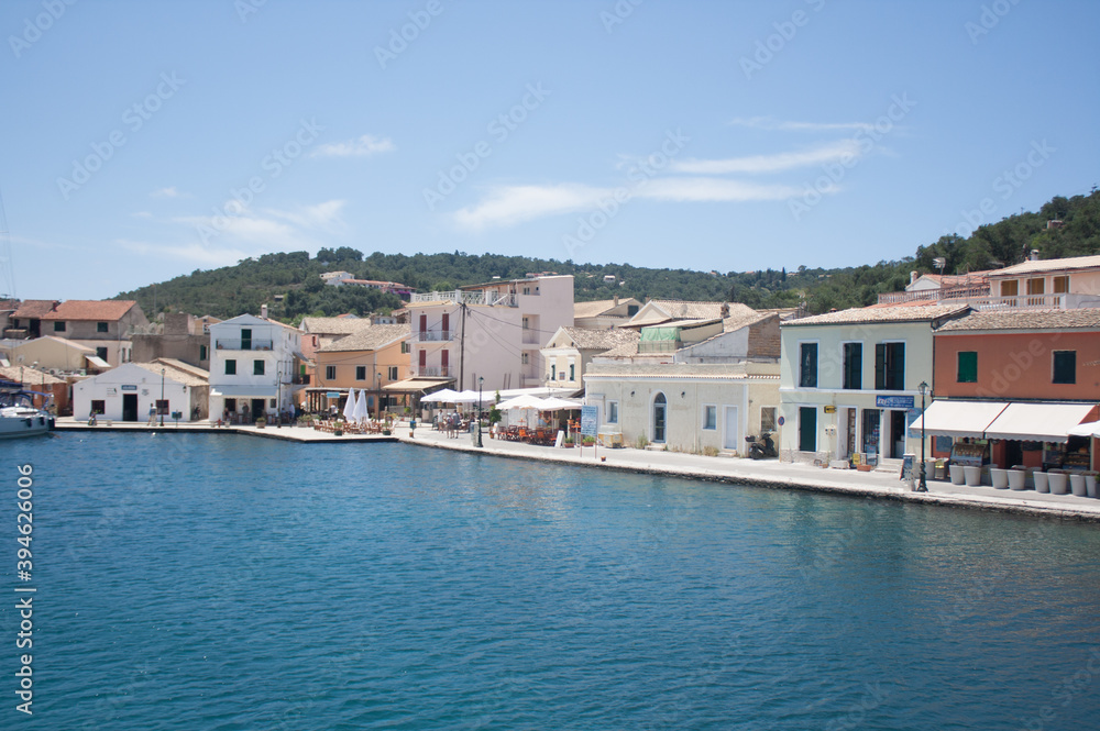 View of a cozy Greek village from the sea