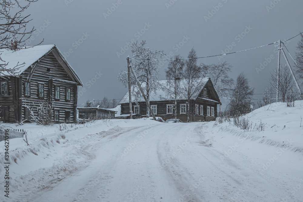 Small old village in the Russian north. Winter morning in the village. Small old village in the Russian north. Winter morning in the village.