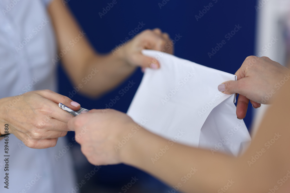 Transfer of a parcel in exchange for money. Fast parcel and mail delivery concept Transfer of a parcel in exchange for money. Fast parcel and mail delivery concept