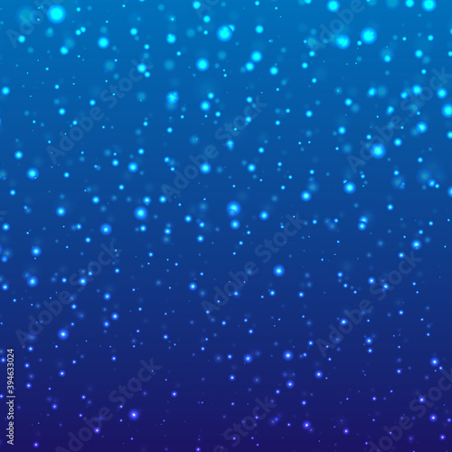 Realistic falling snow or snowflakes on blue winter background