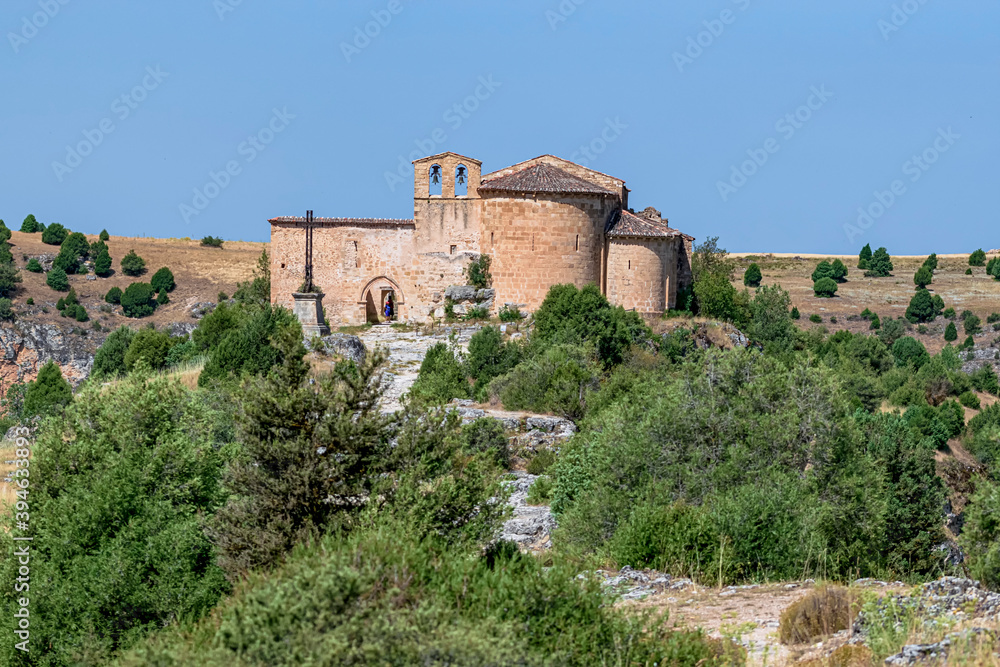 Front view of the Ermita de San Frutos, an old sanctuary, in the middle of the natural park. Photograph taken in Burgomillodo, Segovia, Spain.