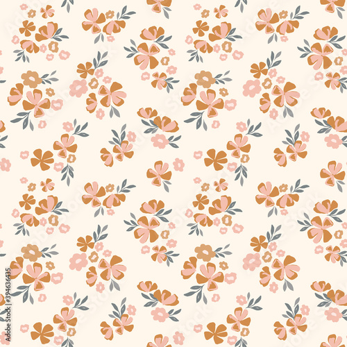 Vintage ditsy floral pattern. Floral vector seamless background in beige, brown and pink. Flower print for textile, fashion, home decor, wallpaper, gift wrap.