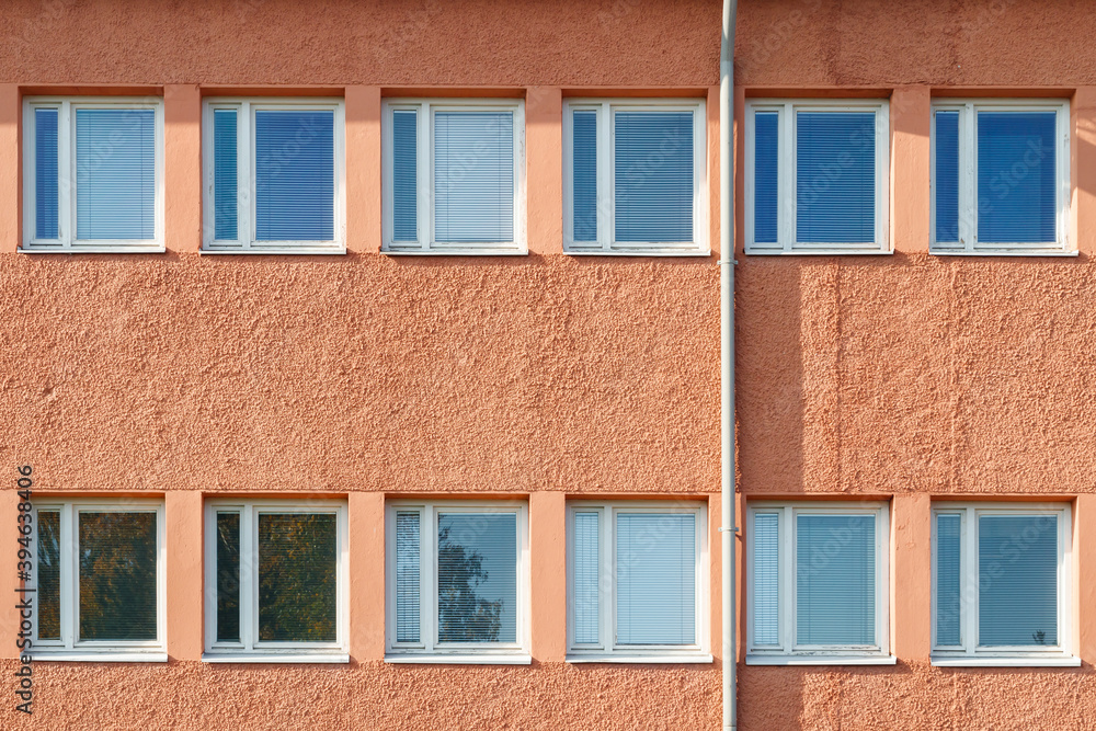 Facade of a building with rows of windows