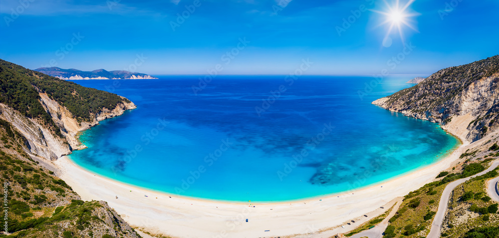 Wide panoramic view to the popular beach of Myrtos, Kefalonia island, Greece, with turquoise, calm sea